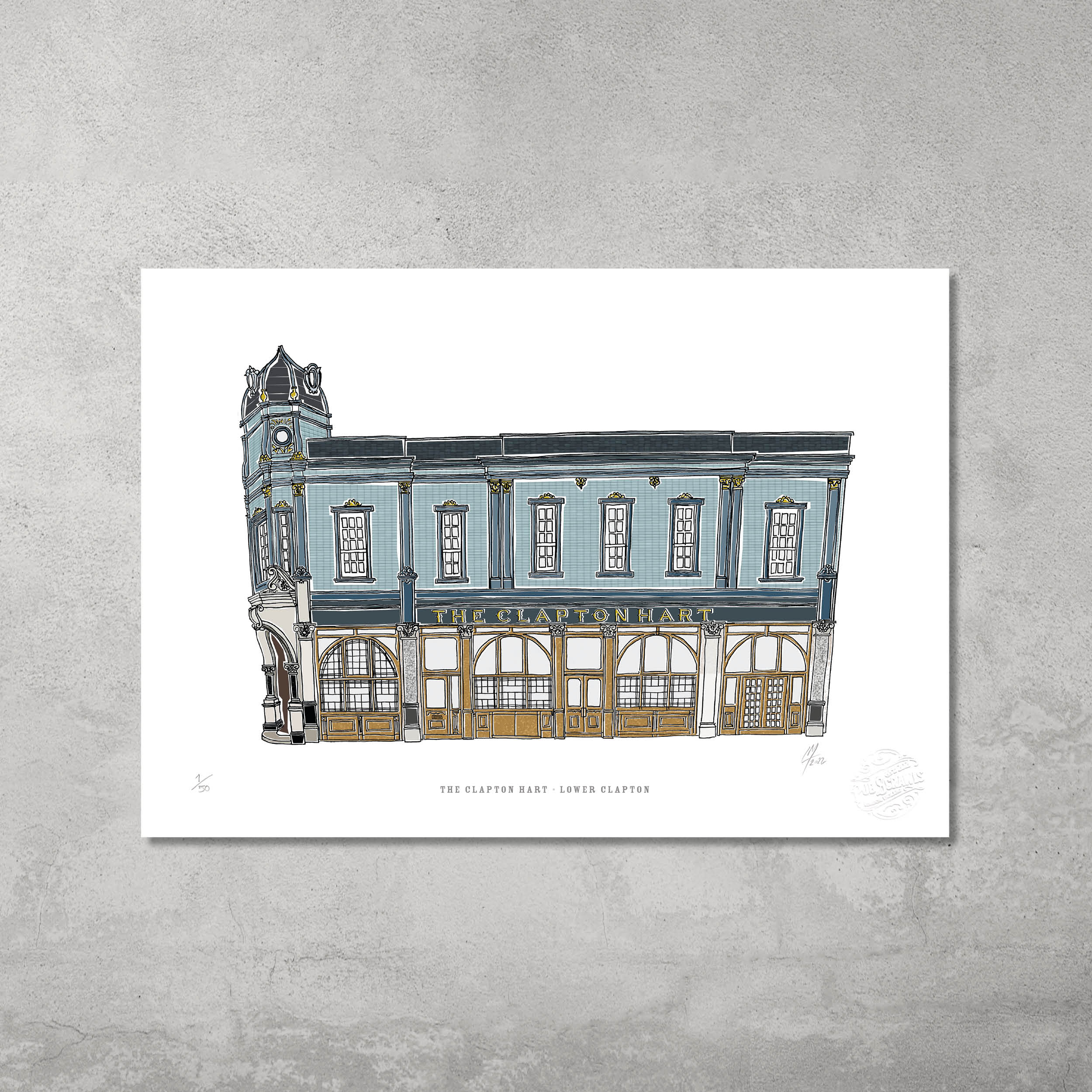 The Clapton Hart – Limited Edition of 50 A3 colour prints by 45 Original features a blue and white pub with ornate windows and a small tower, perfect for Hackney Pub Crawl fans, displayed against a plain concrete wall.