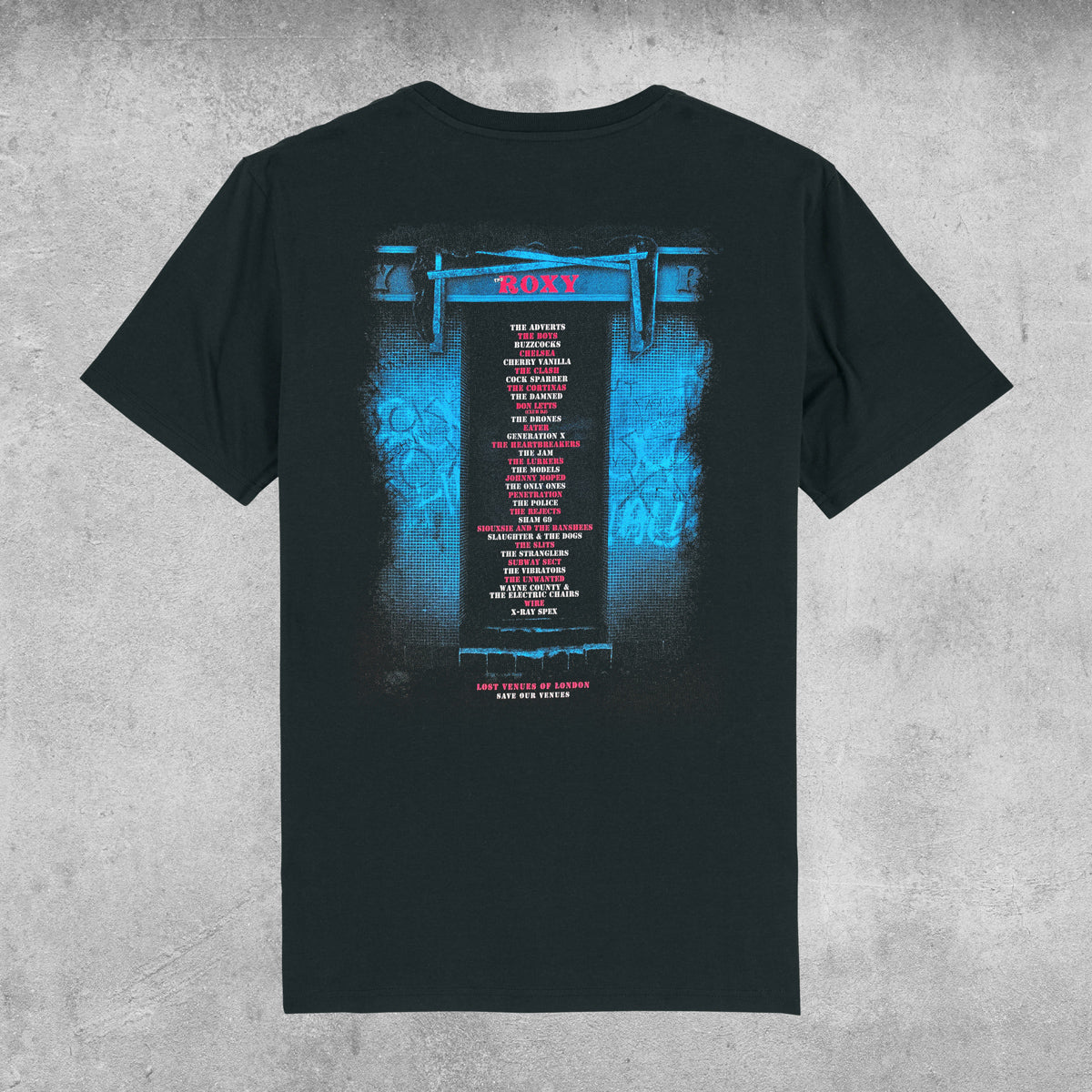 The Roxy Club T-Shirt – Limited Edition of Only 100 by My Store: black tee with blue-and-red Club Retrospective Art graphic, featuring event and band names in red below the iconic London venues name, set on bold abstract blue imagery.