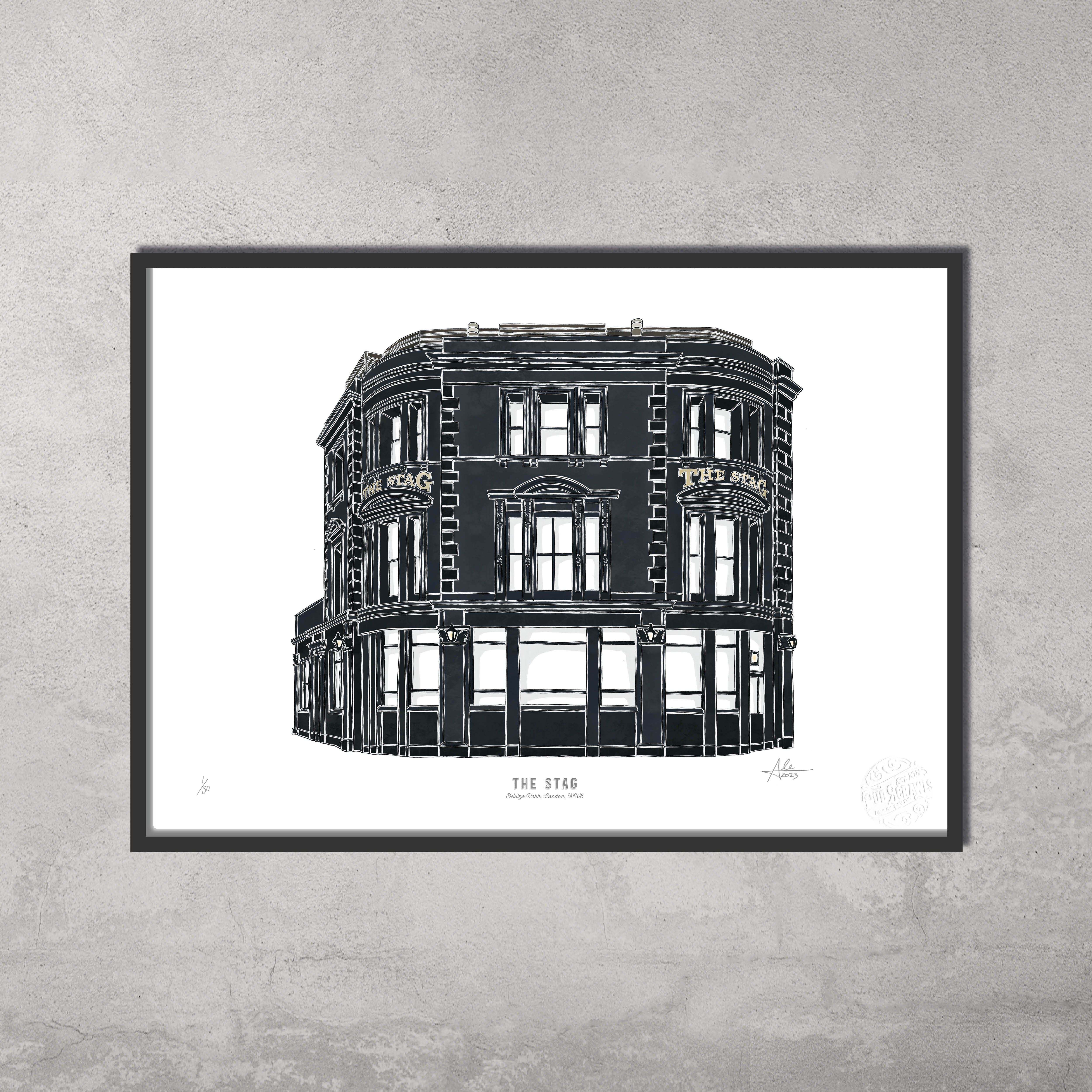 Framed The Stag – Limited Edition of 50 – A3 Colour Prints by 45 Original, featuring a three-story pub, decorates a light gray textured wall. Part of the Hampstead & Highgate Pub Crawl giclée fine art series.