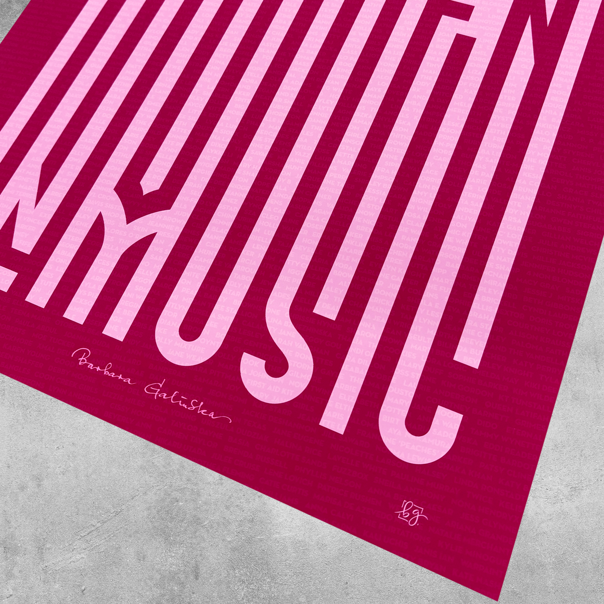 A close-up of the Women In Music maroon and light pink print by 45 Original, limited to 25 editions, featuring bold MUSIC text, Barbara Gollackner’s signature, a small monogram, and set against a light gray concrete background.
